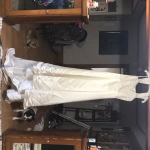 Wedding dress never worn never been sized!! It is a size 12 can have it fitted